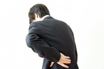 Businessman with back pain