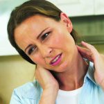 Woman with neck pain or headache